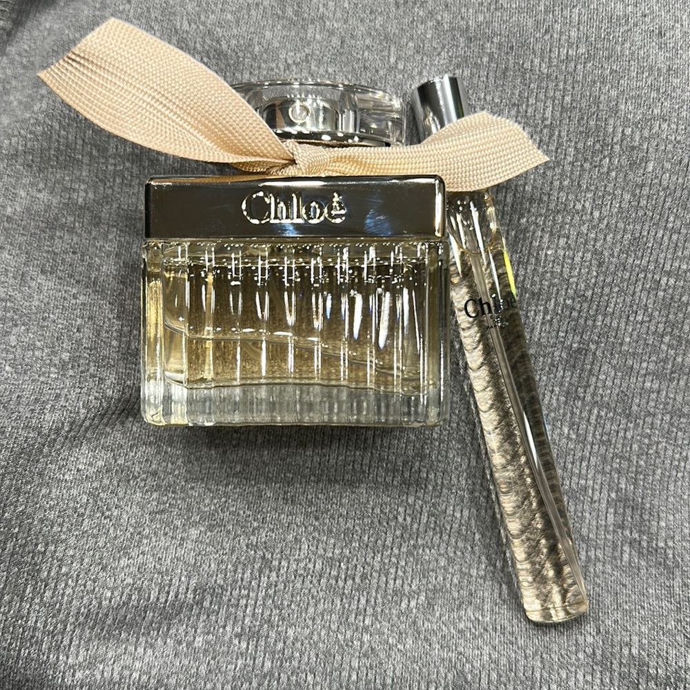 Chloe perfume 1.6 oz with travel size spray.  Used once